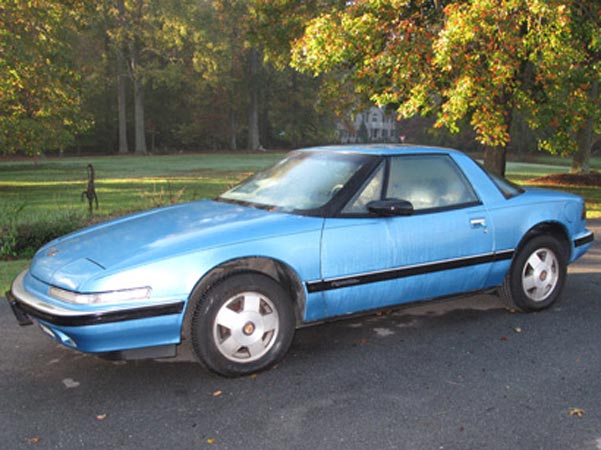 	1990 Blue Buick Reatta Coupe $1,200