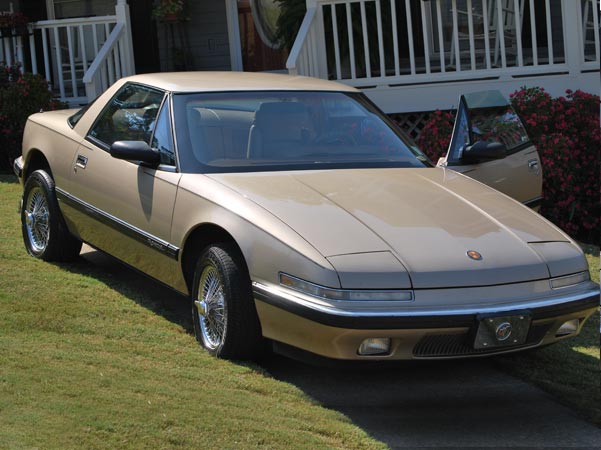1990 Champagne-Gold Buick Reatta Coupe $5,500