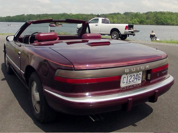 	1990 Burgundy Buick Reatta Convertible $5,500