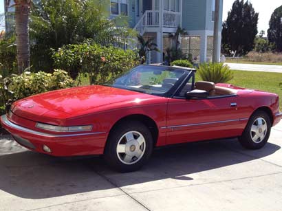 	1990 Red Buick Reatta Convertible $8,000