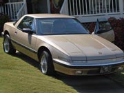 1990 Champagne-Gold Buick Reatta Coupe $5,500